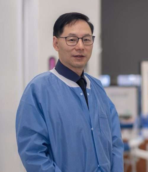 Dr. John Shi, principal dentist at Centre Dental — modern NYC AI dental center